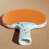 préssec makes a ping pong paddle from terrazzo-like recycled plastic